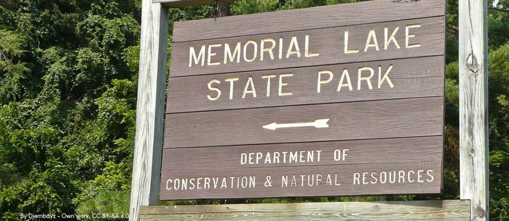 wooden sign for Memorial Lake State Park